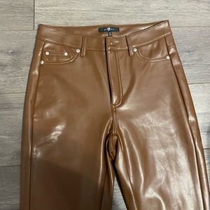 Brown leather pants.